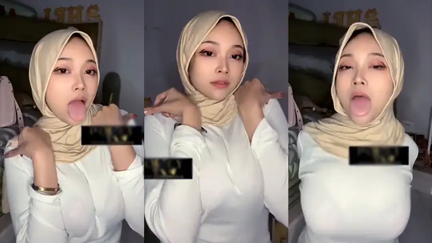 Bokep Jilbab Baju Putih Belahan Toket Gede Menggoda